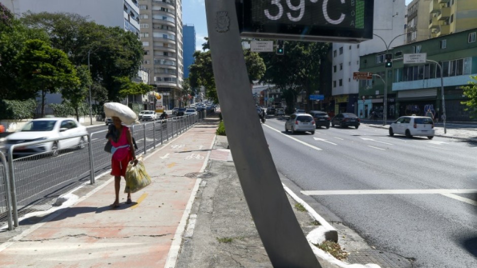 A thermometer shows a temperature of 39 degrees Celsius (102.2 F) in Sao Paulo, Brazil on March 17, 2024