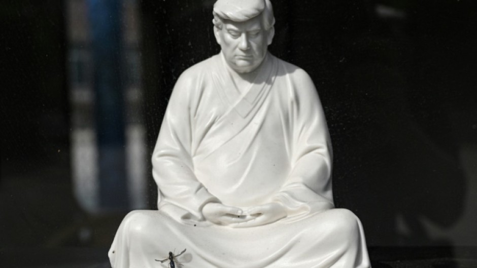 The porcelain sculptures of Trump in Buddha-like poses can fetch up to $2,700, depending on size