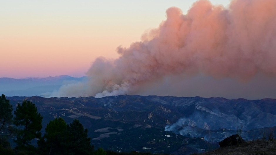 Smoke billows from the Palisades fire