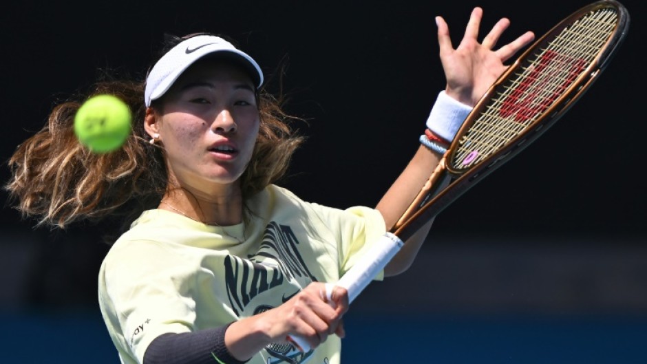 China's Zheng Qinwen hits a return during a practice session ahead of the Australian Open 