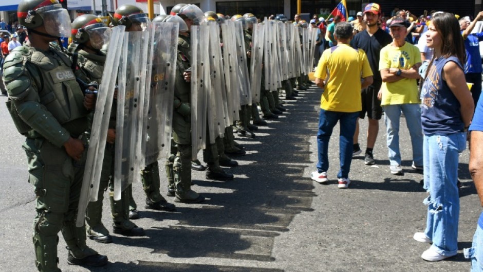 Despite biting economic woes, Maduro has kept a tight grip  on the country with the help of the military and police 