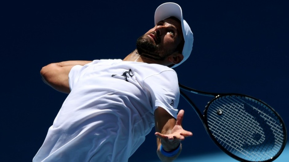 Novak Djokovic is using a so-caled 'energetic disc' to help him at the Australian Open