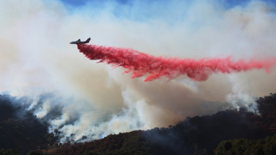 An aggressive air operation is under way to stem the spread of the Palisades Fire as it pushes north and east into previously untouched neighborhoods