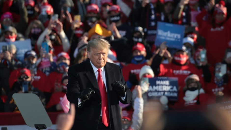 Donald Trump, shown here dancing to a Village People song as he wraps up a campaign rally at Green Bay-Austin Straubel International Airport on October 30, 2020 in Green Bay, Wisconsin