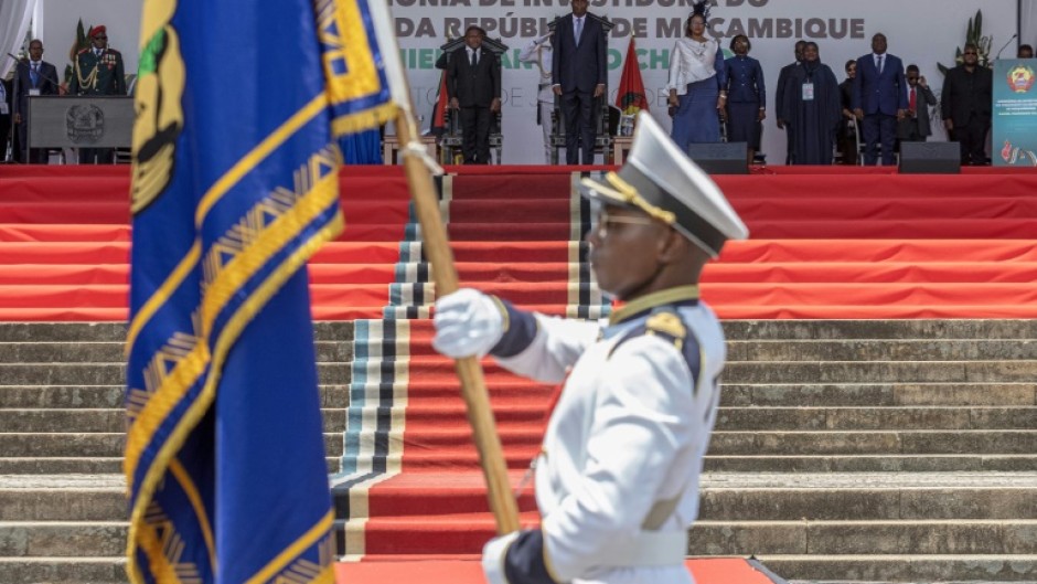 Mozambique's new president Daniel Chapo (CR) was inaugurated under heavy security