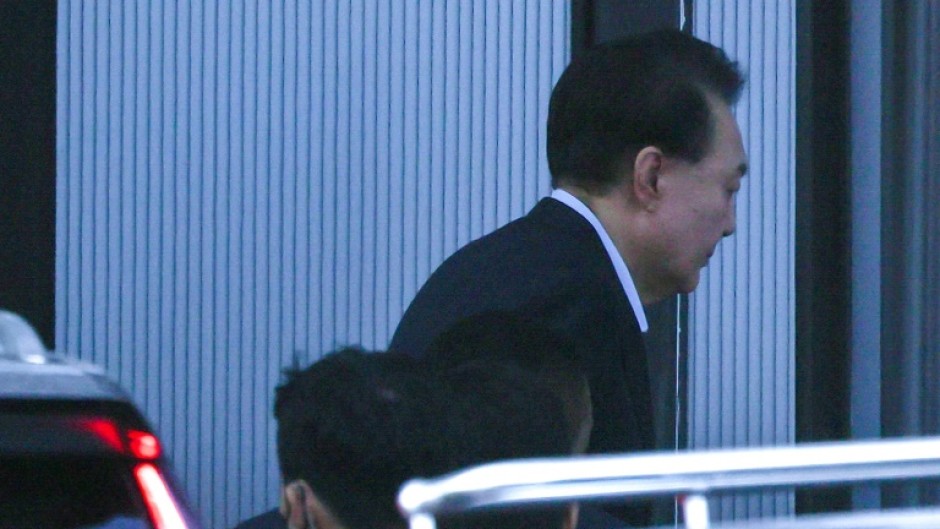 South Korea's impeached President Yoon Suk Yeol arrives at the complex building housing the Corruption Investigation Office for High-ranking Officials (CIO) in Seoul