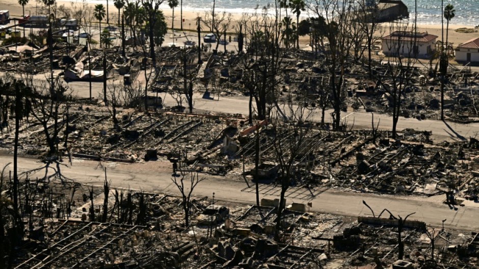 With at least 24 people dead, tens of thousands displaced and whole communities in ruin, Los Angeles is clamoring for answers over what started wildfires