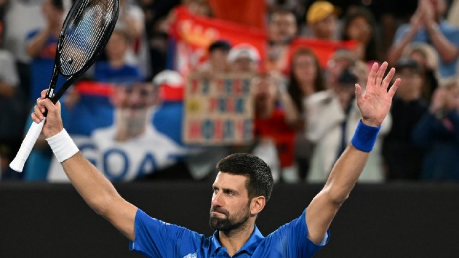 Novak Djokovic celebrates after victory against Portugal's Jaime Faria 