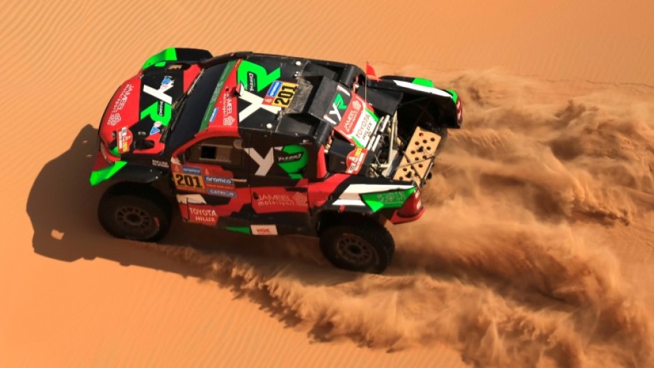 Saudi driver Yazeed al-Rajhi lost the overall lead in the Dakar Rally after getting stuck in sand