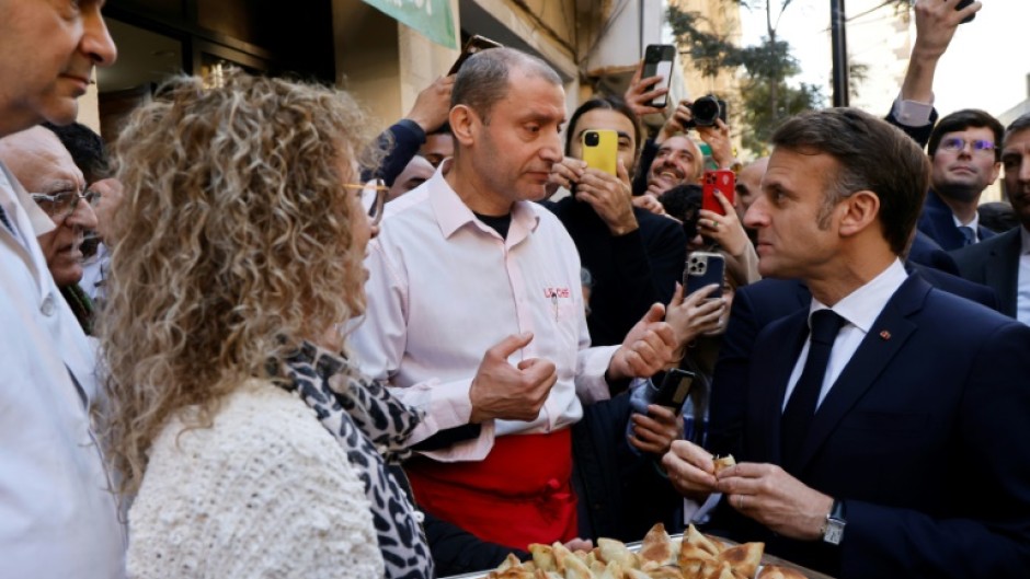 Macron strolled along the lively Beirut neighbourhood of Gemmayzeh a few blocs back from the coastal city's port