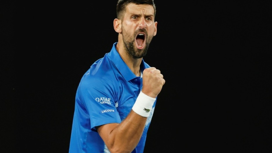 Novak Djokovic reacts after a point against Czech Republic's Tomas Machac 