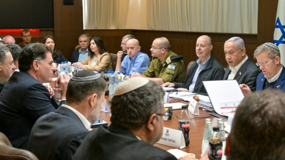 An Israeli Government Press Office picture shows Prime Minister Benjamin Netanyahu (2-R), heading the security cabinet meeting