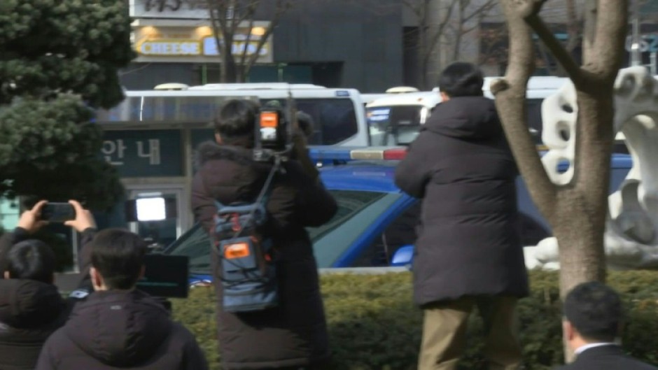 S.Korea: Impeached president arrives for arrest warrant hearing