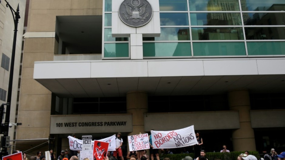 People protest against US Immigration and Customs Enforcement and the first Trump administration's immigration policies outside a Chicago ICE office in 2018