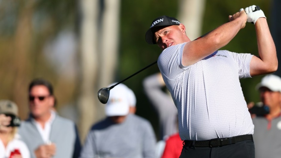 Austrian Sepp Straka plays a tee shot on the way to the 54-hole lead in the US PGA Tour American Express tournament