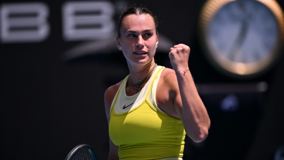 Aryna Sabalenka celebrates beating Mirra Andreeva