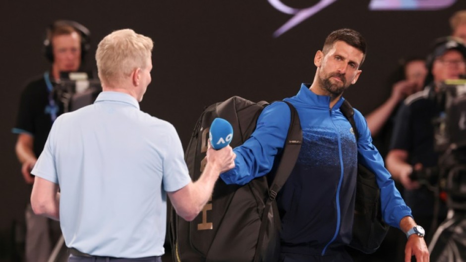 Novak Djokovic (R) refused to do an on-court interview after his last 16 match at the Australian Open  