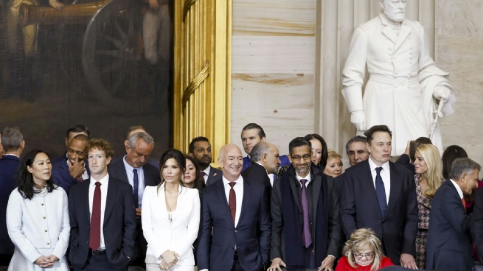 Priscilla Chan, Meta CEO Mark Zuckerberg, Lauren Sanchez,  Jeff Bezos, Alphabet’s CEO Sundar Pichai, and businessman Elon Musk, attend the inauguration ceremony of US President-elect Donald Trump in the US Capitol Rotunda in Washington, DC