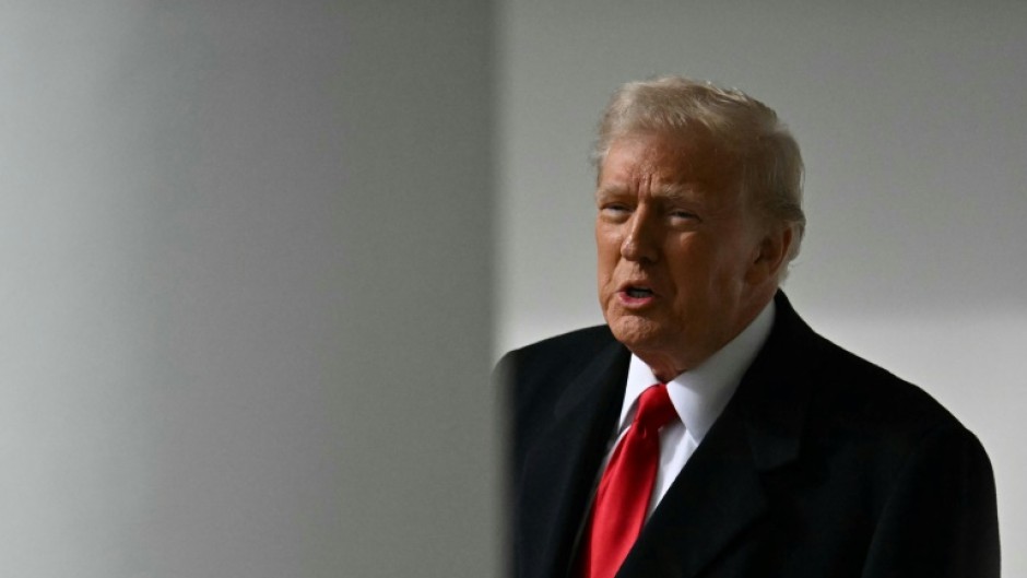 US President Donald Trump speaks to the press on his second day back at the White House