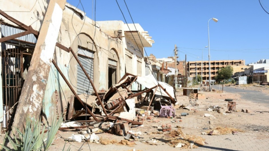 Damaged shops and houses in Sudan's Al-Jazira state capital Wad Madani, after the army regained control from paramilitaries 