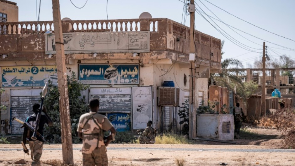 Sudanese army soldiers patrol an area in Khartoum North on November 3, 2024