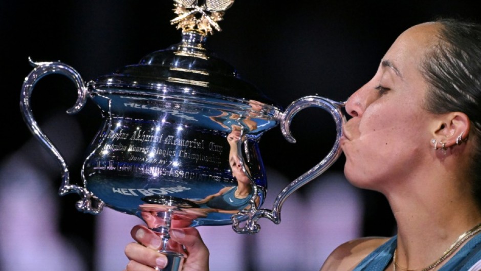 Madison Keys poses with the Daphne Akhurst Memorial Cup after her victory over Aryna Sabalenka