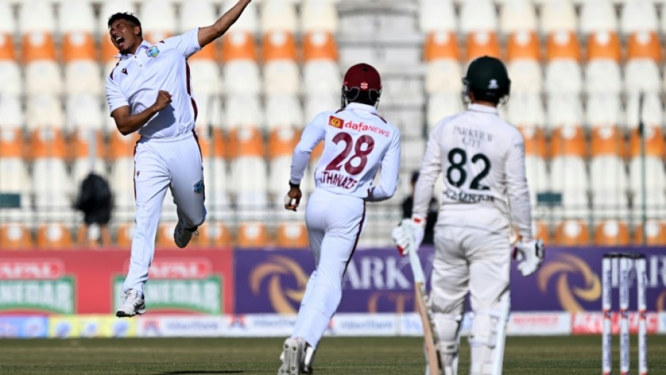 Gudakesh Motie celebrates taking the wicket of Kamran Ghulam in Multan