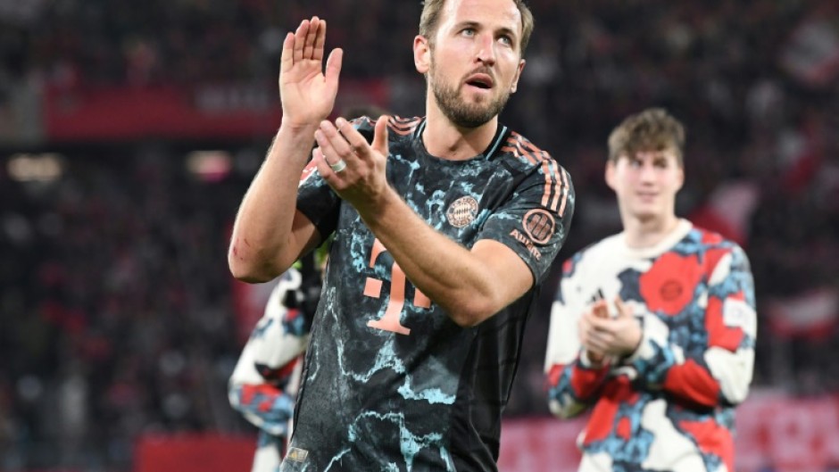 On target: Harry Kane celebrates after Bayern's win over Freiburg on Saturday