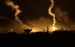 This picture taken from a position near Sderot along the Israeli border with the Gaza Strip early on November 13, 2023, shows flares dropped by Israeli forces above the Palestinian enclave amid ongoing battles between Israel and the Palestinian Hamas movement.