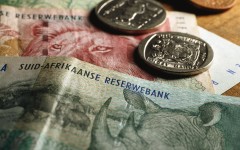 File: South African rands seen on a desk. AFP