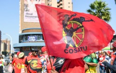 Members of Cosatu waving a flag. Darren Stewart/Gallo Images via Getty Images