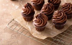 File: Dark chocolate cupcakes with chocolate ganache frosting. GettyImages/VeselovaElena