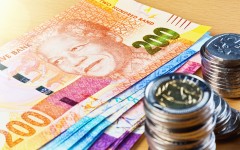 File: South African rands and rand coins. GettyImages/RapidEye