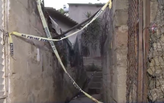 Crime scene tape at one of the houses in Lusikisiki. 