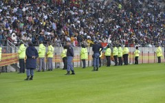 Unruly fans invaded the pitch during the first half of the game. BackpagePix/Deryck Foster