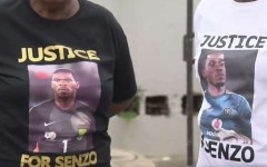 Family members with shirts calling for justice for Senzo Meyiwa.