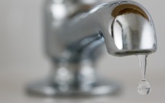 File: Water drips from a tap. GettyImages/Tim Graham