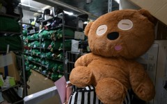 A teddy bear sits amongst thousands of items -- all bagged, tagged and organised based on where and when they were lost - at the Tokyo police department's lost and found centre