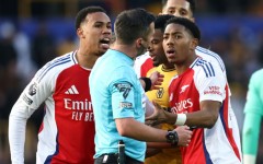 Arsenal's Myles Lewis-Skelly (R) reacts after being sent off at Wolves