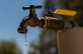 File: Water dripping from a tap. GettyImages/Bloomberg Creative