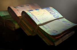 A close-up view of stacks of South African rand banknotes. GettyImages/allanswart