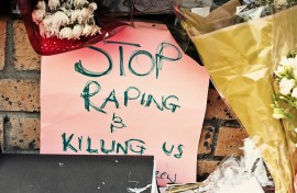 File: A sign left as a protest against gender violence at the scene of a rape and murder. GettyImages/RapidEye