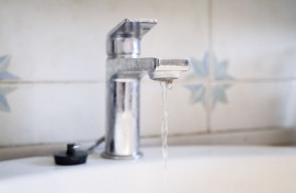 File: Water dripping from a tap. GettyImages/NurPhoto