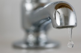 File: Water drips from a tap. GettyImages/Tim Graham