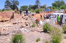 Authorities at the mine shaft in Stilfontein. eNCA