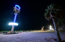 Floodlights illuminate the Umm Suqeim beach in Dubai to make it safer for beachgoers at night when the scorching heat of the Gulf has abated