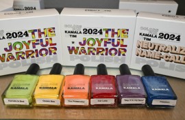 Nail polishes from 'The Joyful Warrior' set include a green called 'Kamala Is Brat,' an orange called 'The Prosecutor' and a classic red dubbed 'Cat Lady'