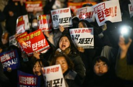 People take part in a protest calling for the resignation of South Korean President Yoon Suk Yeol in Seoul