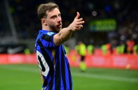 Carlos Augusto celebrates after scoring for Inter Milan in the win over Como