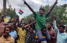 People in Sudan's de facto capital Port Sudan, which hosts the army-aligned government, take to the streets to celebrate the reported advance of Sudanese military forces and allied armed groups on the key Al-Jazira state capital, Wad Madani